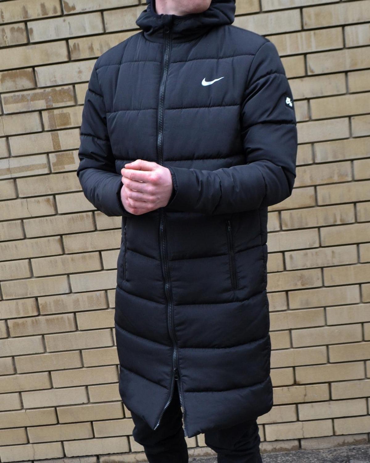 Подовжений пуховик Nike