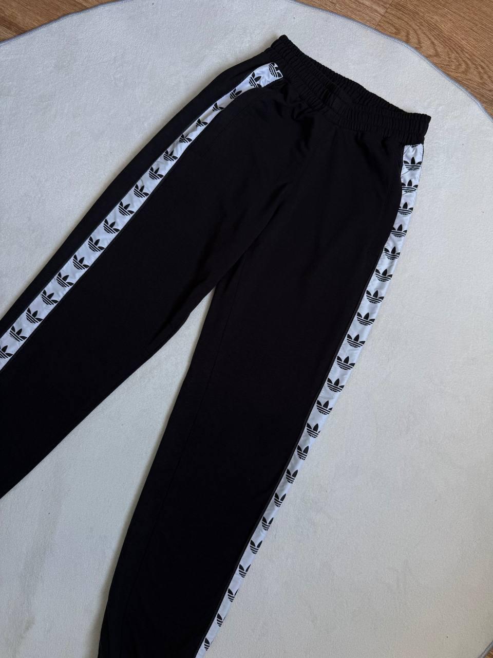 Штани Adidas із лампасами