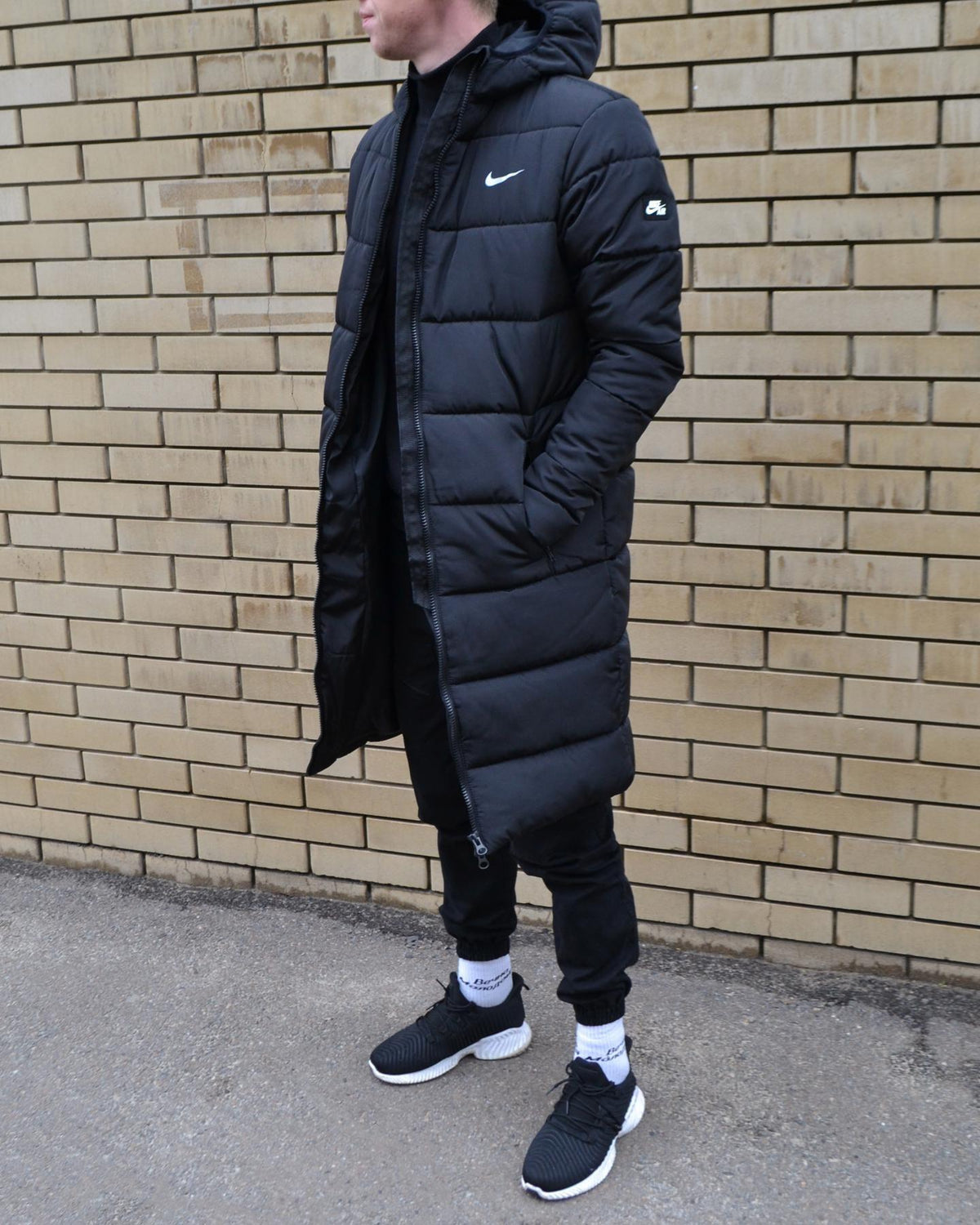 Подовжений пуховик Nike